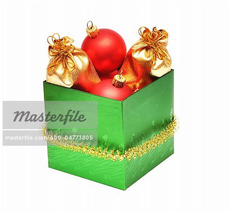 christmas baubles in gift box on white