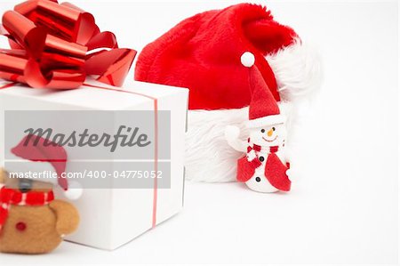 Santa hat and gift isolated on white background