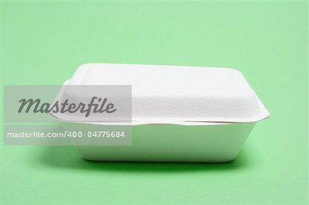 Polystyrene Food Box on green Background