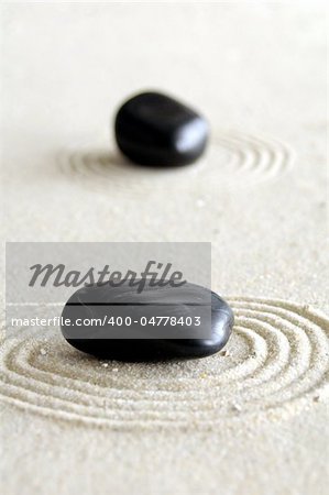 zen garden with sand stones and copyspace for a text message