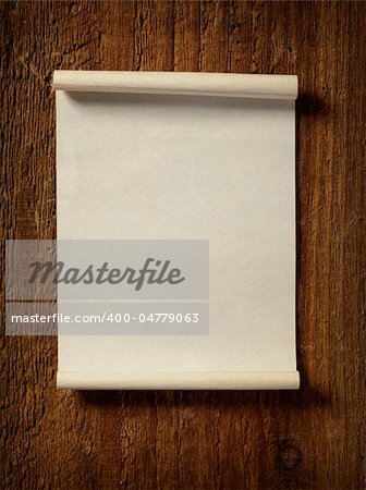 close up of grunge note paper on wooden background