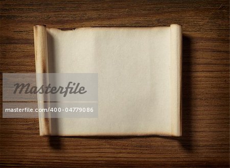 close up of grunge note paper on wooden background