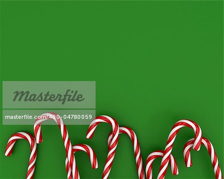 A lot of christmas candies on green background