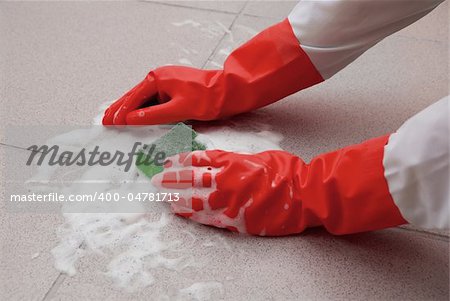 protecting hand from detergents, washing floor by cleaning sponge
