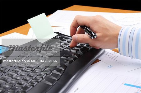 Businessman at office working at his workplace.