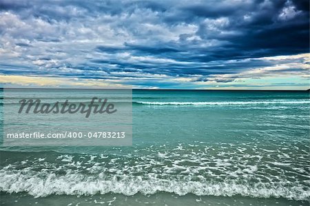 Beautiful beach and dramatic sky. Stormy weather