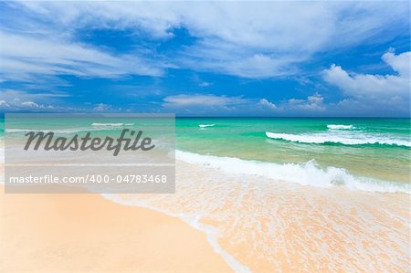Beautiful sandy tropical beach in sunny day