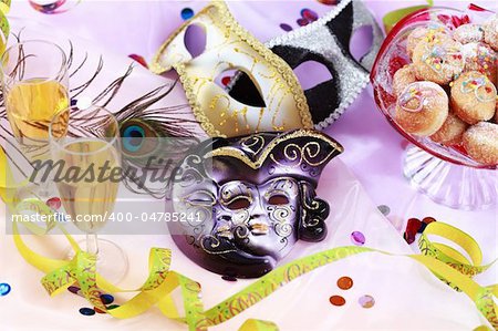 Carnival and party place setting with mask