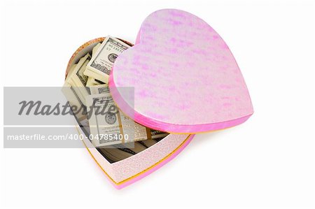 Heart shaped gift box and dollars inside