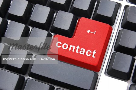 contact button on laptop showing computer support concept