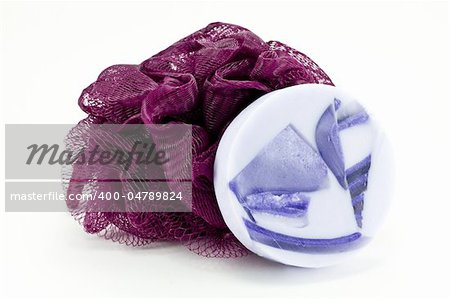lavender soap and purple bath sponge