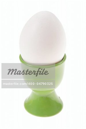 egg in eggcup photo on the white background