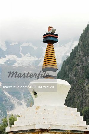 Landmark of a white buddhist stupa in Shangrila China