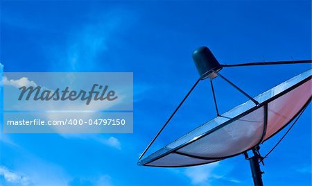 Satellite dish in blue sky