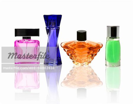 Perfume color glass bottles isolated on white with transparant relection.