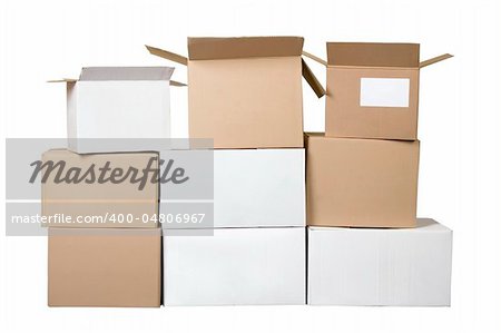 Isolated brown and white different cardboard boxes arranged in stack