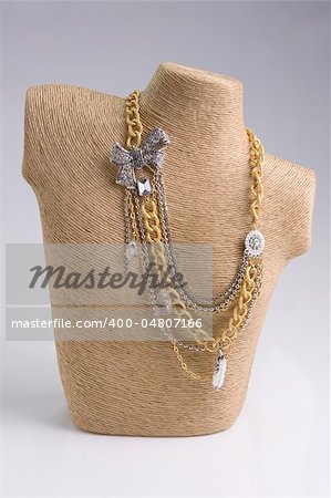 Luxury golden fashion necklace on display