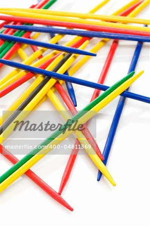 mikado sticks on white background. vertical composition