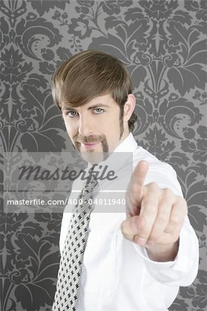 point finger retro businessman salesperson on gray vintage wallpaper