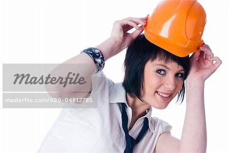 Young businesswoman in protective helmet isolated on white