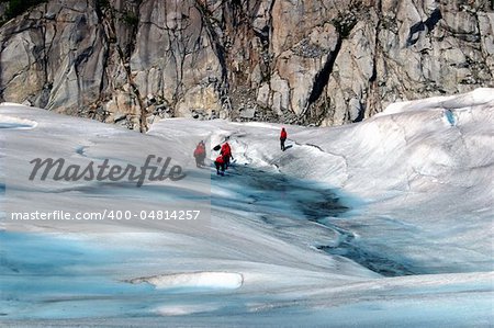 Ice trekking high up on a glacer in the state of Alaska