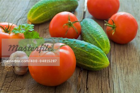 Fresh vegetables: tomatoes and cucumbers. Photo of healthy eating