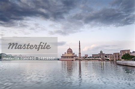 Landscape of mosque with river under blue sky in Putrajaya, Malaysia, Asia.