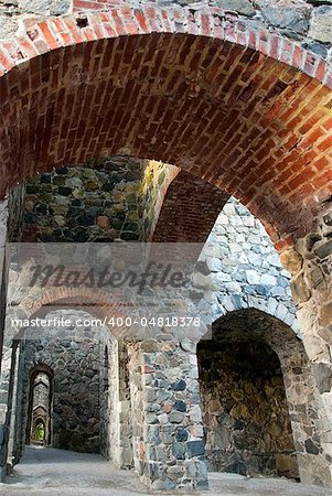 Interior of ancient stone ruin witharches
