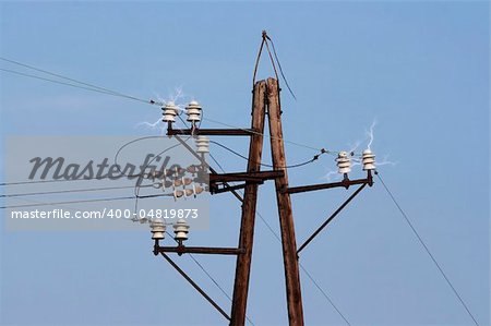 Detail of the old power-transmission pole - electric power line - short circuit