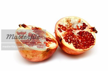 fresh and tasty pomegranate isolated on white