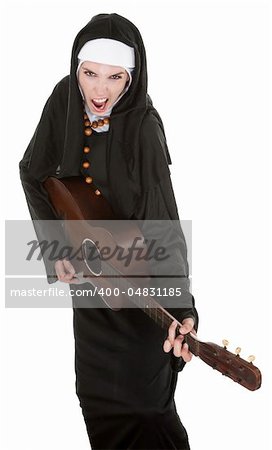 Funny nun sings a song while playing her guitar