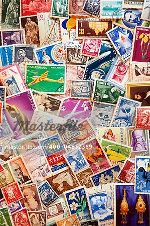 Pile of used post stamps from communist Romania
