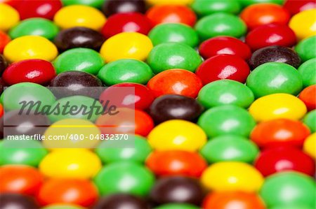 Background of colorful candies coated chocolate sweets