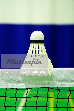 shot of badminton shuttlecock  on the net