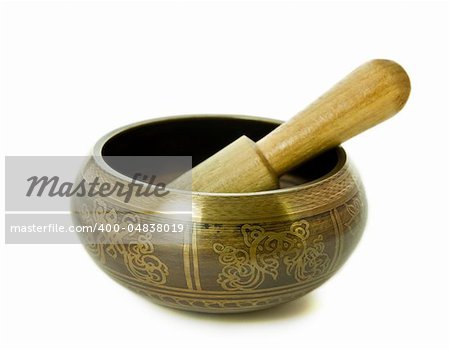 Tibetan singing bowl isolated on a white background