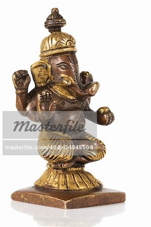 Ancient Statuette of Ganesha isolated on a white background