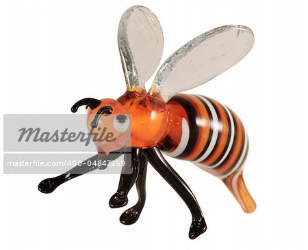Glass statuette - little bee on white background
