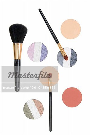 Make-up brush and powder eye shadows isolated on white background