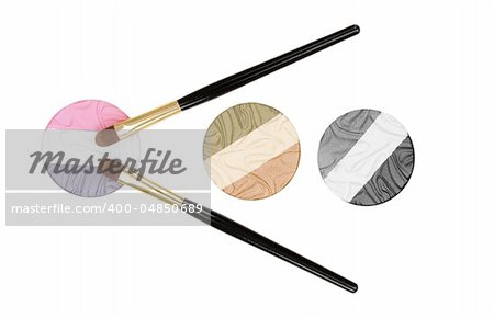 Make-up brush and powder eye shadows isolated on white background
