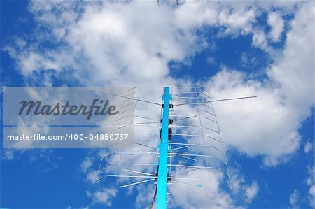 DM antena at blue sky background.