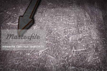 rusty metal arrow on grunge background - 3d illustration