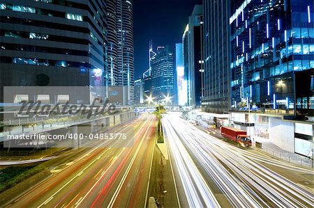 traffic night and modern building in hong kong