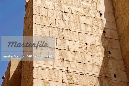 Illustrated walls of Egyptian temple Karnak in Luxor