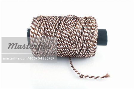 Clew of twine isolated on white background