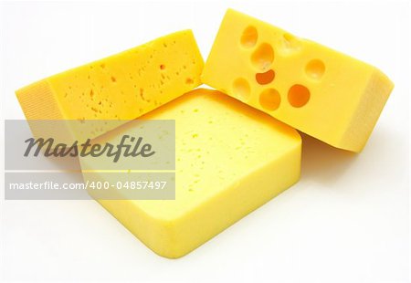 three pieces of different kinds of cheese isolated on a white background