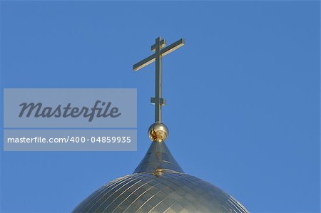 Golden Dome On Russian Orthodox Church over blue sky