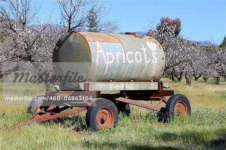 Apricot advertisement on an old water tank hanger.