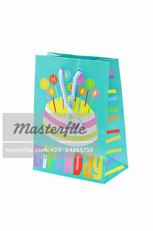 Colorful birthday party gift bag isolated on white