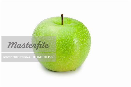 Green wet apple on a white background
