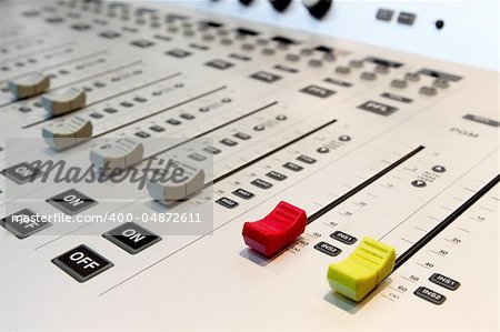 Sound mixer, low angle shot with shallow DOF, useful for various music and sound themes